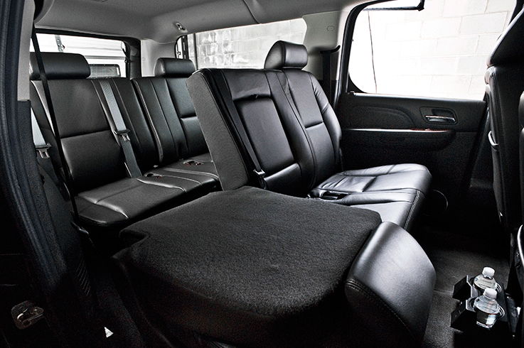 The leather interior of a Cadillac Escalade chauffeured SUV from Commonwealth Worldwide.